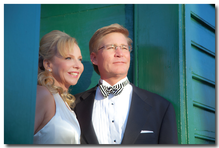 raleigh wedding photographer-photo of bride and groom-green wall
