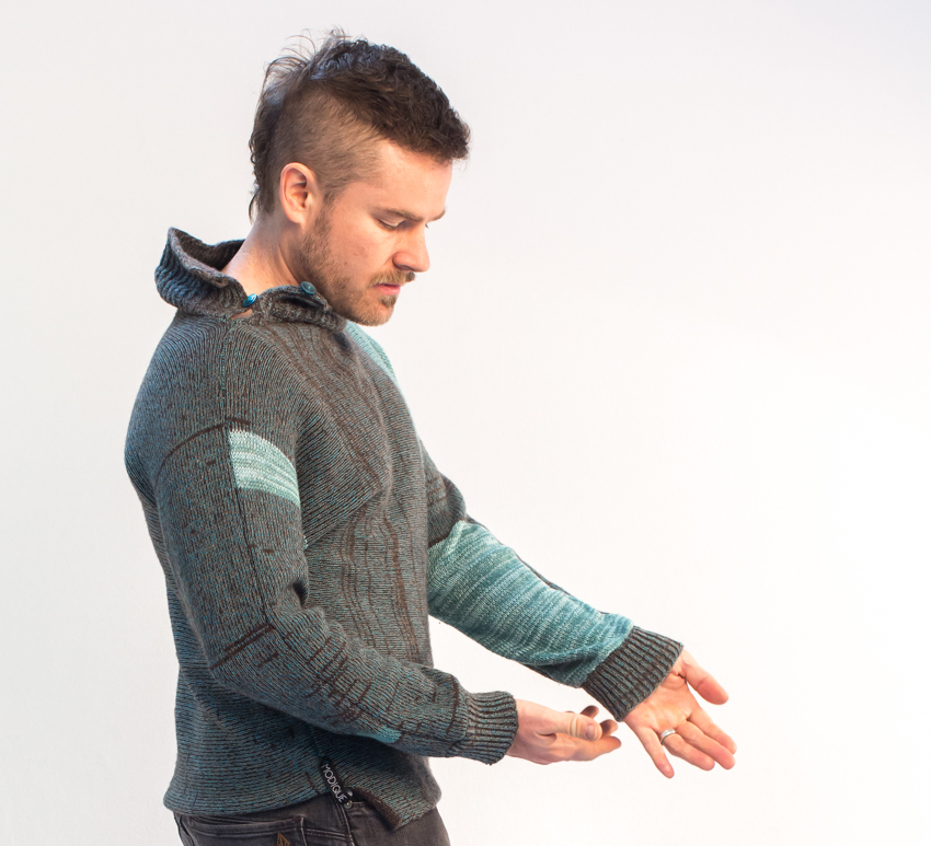 Male modeling Modique Couture sweater