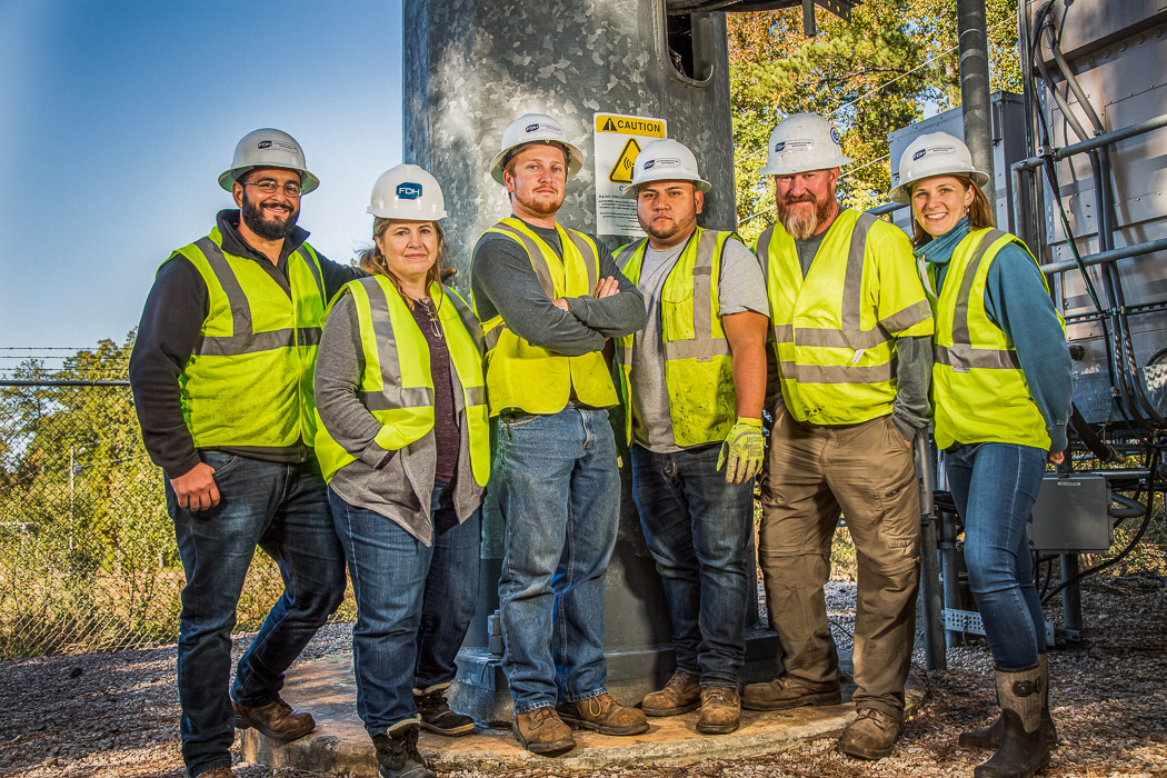 Commercial photographer in Raleigh, NC — utility crew team portrait in safety gear
